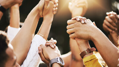 Individuals holding hands symbolizing Bella Medical Associates’ community support group offering compassionate guidance, connection, and emotional wellness resources in North Carolina.